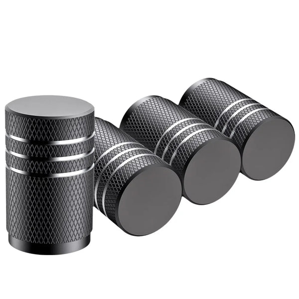 4Pcs aluminum tire valve stem caps with knurled design, universal fit for car and motorcycle wheels, dustproof and leakproof.